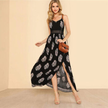 Maxi Vestido negro detalles plumas blancas
