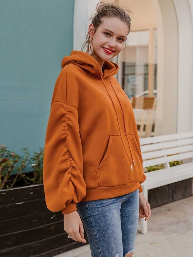 Polera naranja con capucha y cordón - Imagen 8