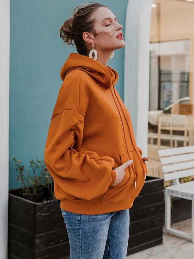 Polera naranja con capucha y cordón - Imagen 5