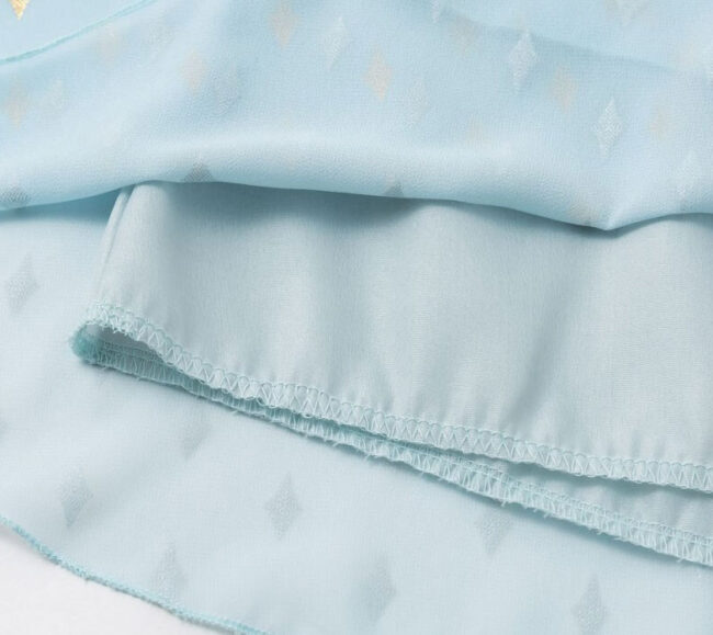 Vestido de gasa con escote triangular y botones - Imagen 6